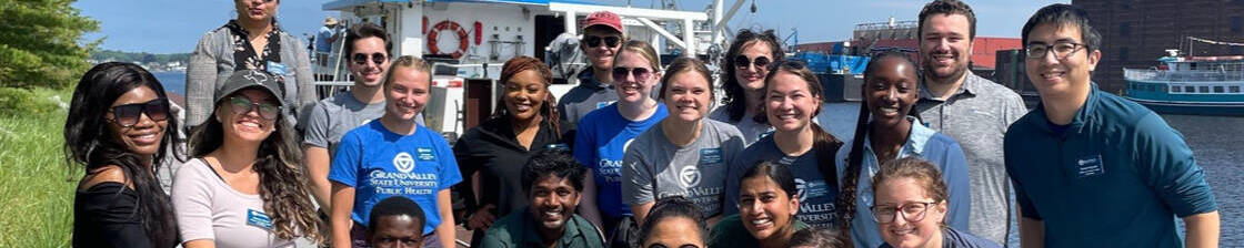 Public Health students gathered by the shore